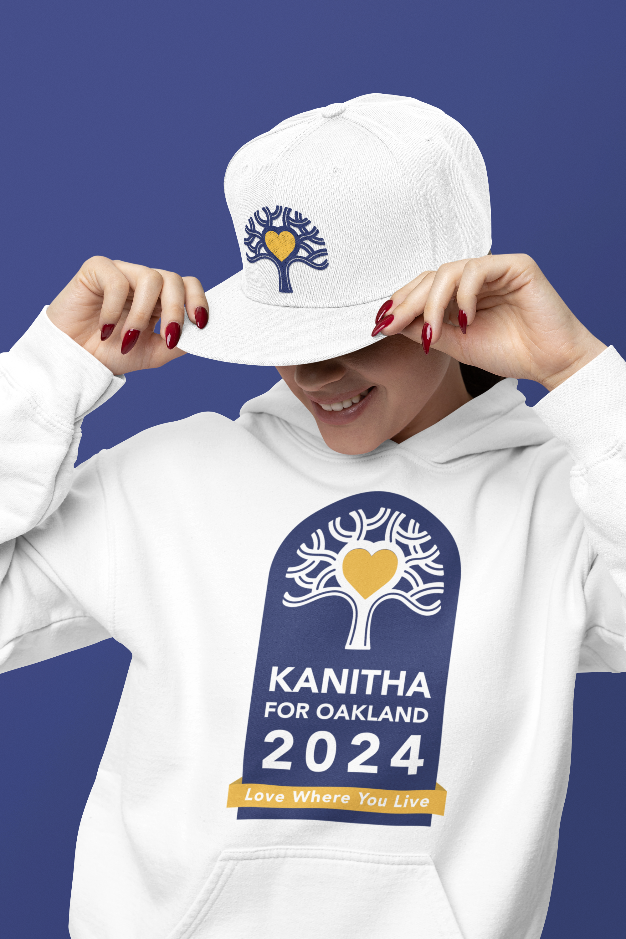gildan-hoodie-mockup-of-a-happy-woman-posing-with-a-hatchback-hat-in-a-studio-m38559.png