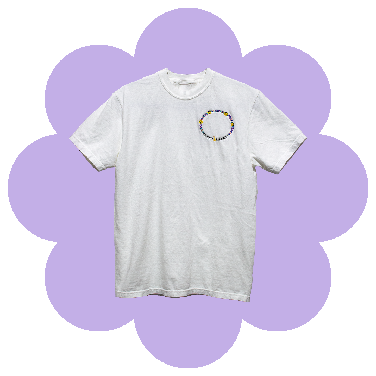White T-Shirt with embroidery on the left chest of a multi-colored charm bracelet with Smiley face charms and tiles that spell out "Funny Papers"
