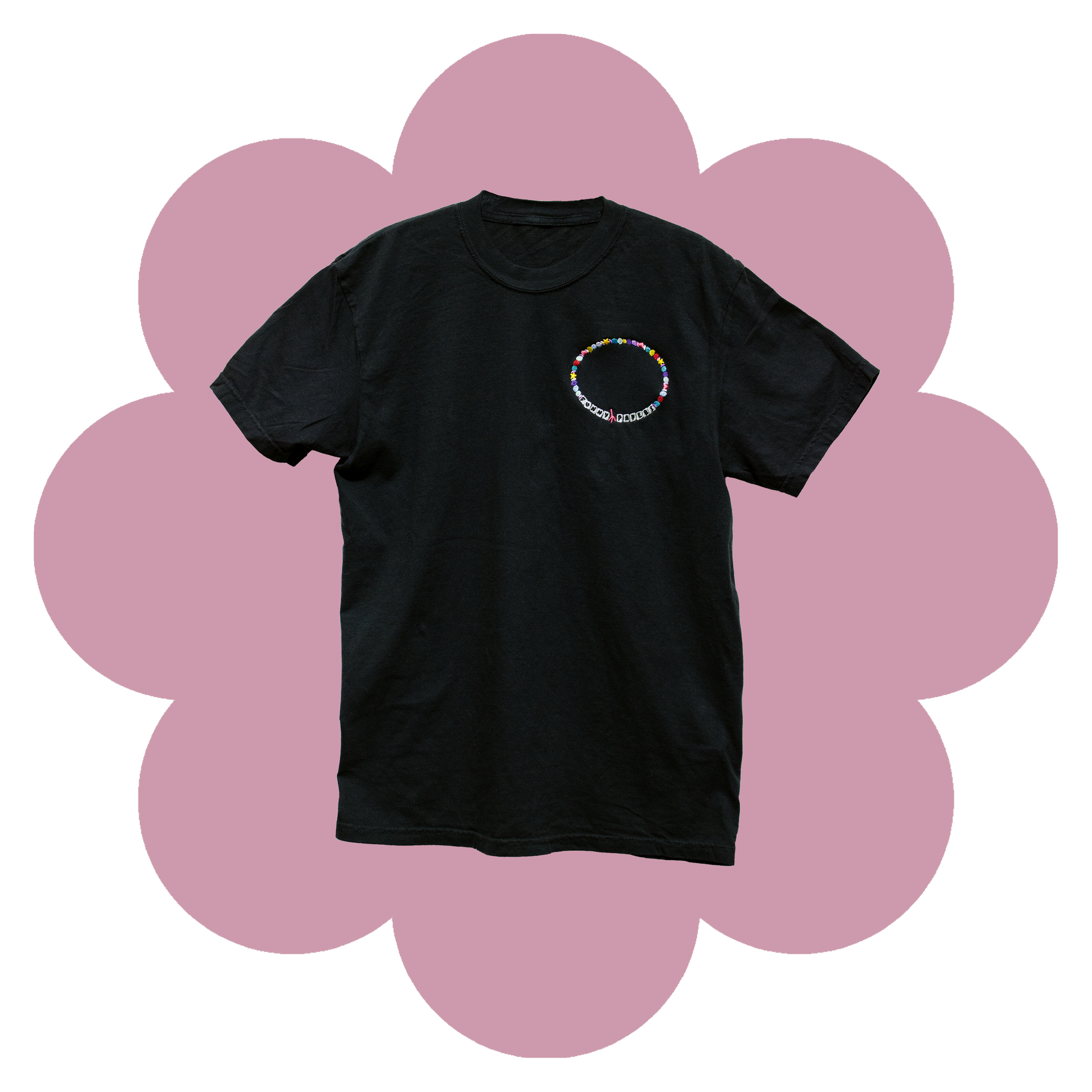 Black T-Shirt with embroidery on the left chest of a multi-colored charm bracelet with Heart and Star charms and tiles that spell out "Funny Papers"