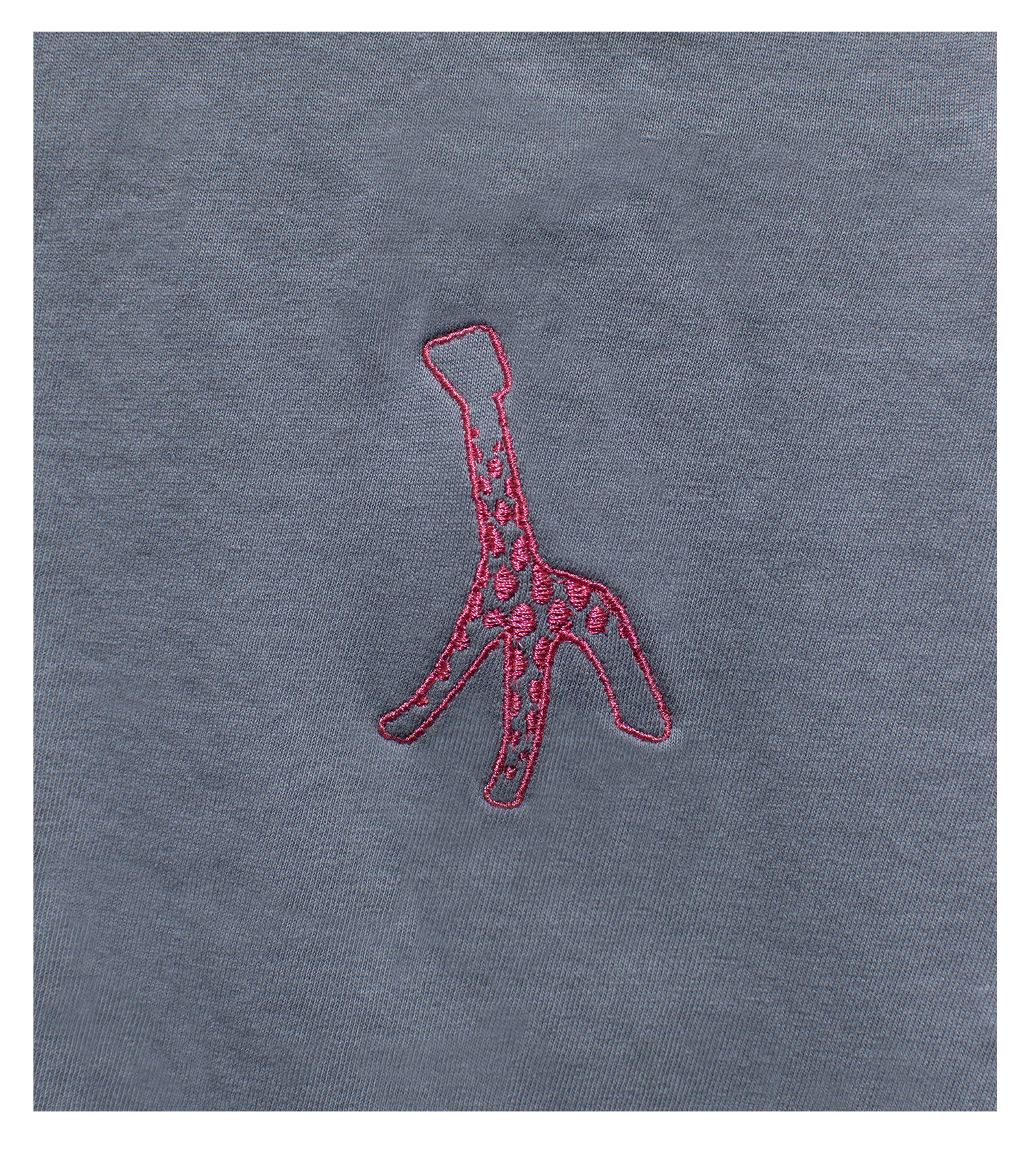 Detail of Washed Grey t-shirt with Rose colored Giraffe embroidery on left chest