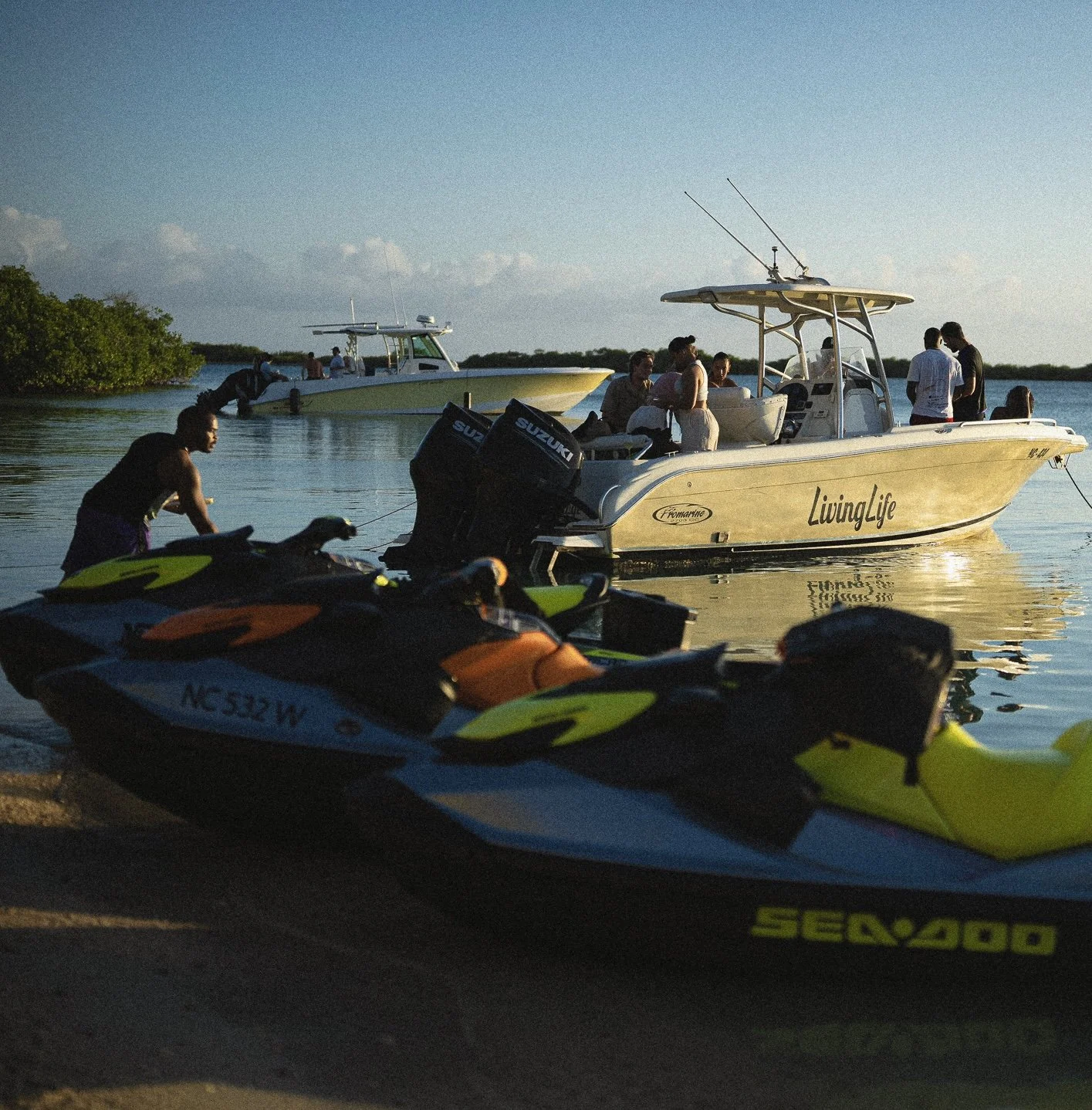 Private boat exploring the coastline during the full-day DXA Coastal Drift experience.