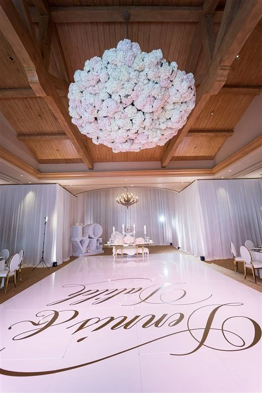 Why Your Wedding Reception Chandelier Should Be a Statement Piece