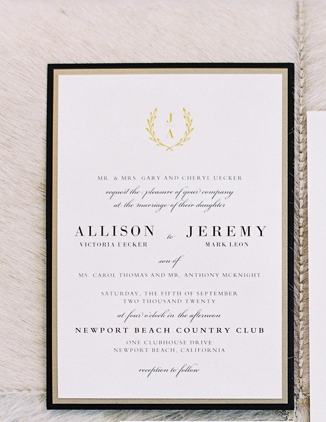 leafy-gold-monogram-black-white-wedding-invitation