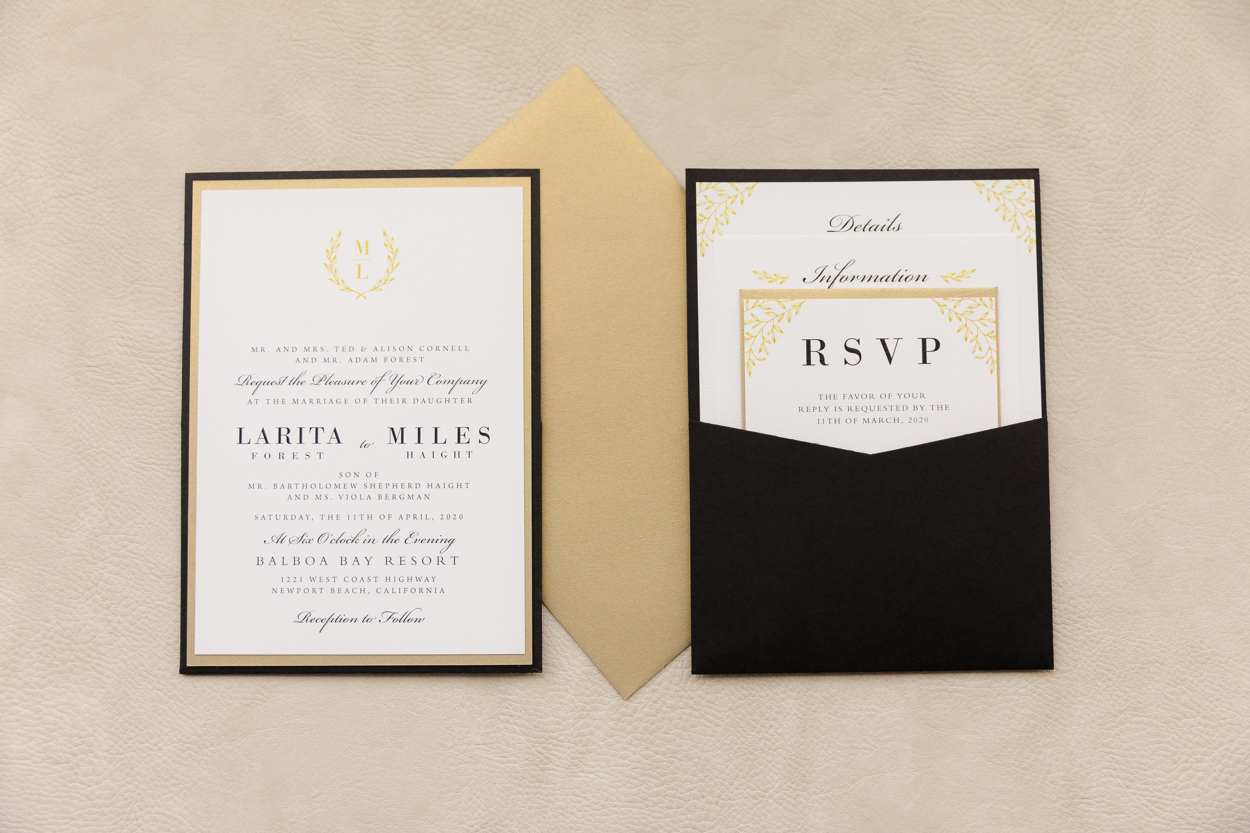 leafy-gold-monogram-black-white-wedding-invitation