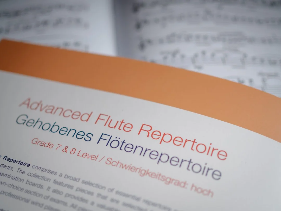 Back cover of Advanced Flute Repertoire Grades 7–8 Level flute sheet music book showing repertoire list.