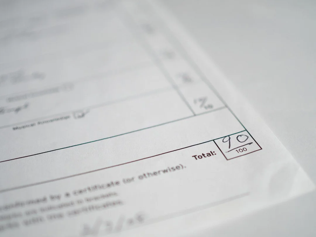 Trinity music exam marksheet displaying total marks awarded at the bottom of the sheet.