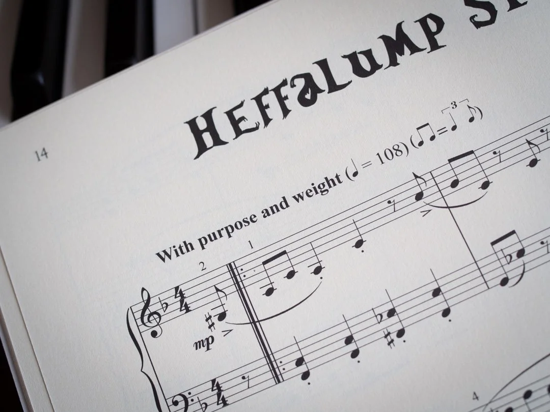 Opening bar of “Heffalump Stomp” from Piano Tales for Winnie-the-Pooh by Nikki Iles