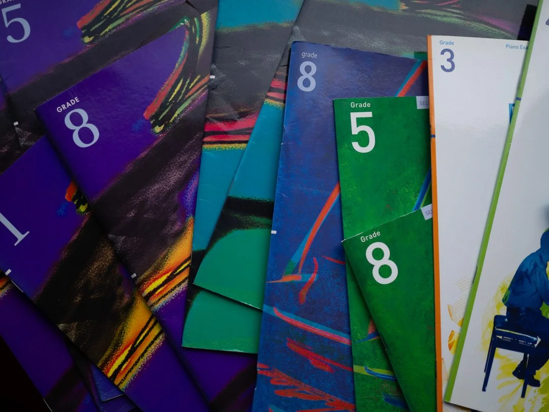 Another view of ABRSM piano exam books from 2004 to 2025, showing the full range of selected piano exam pieces across the syllabus years