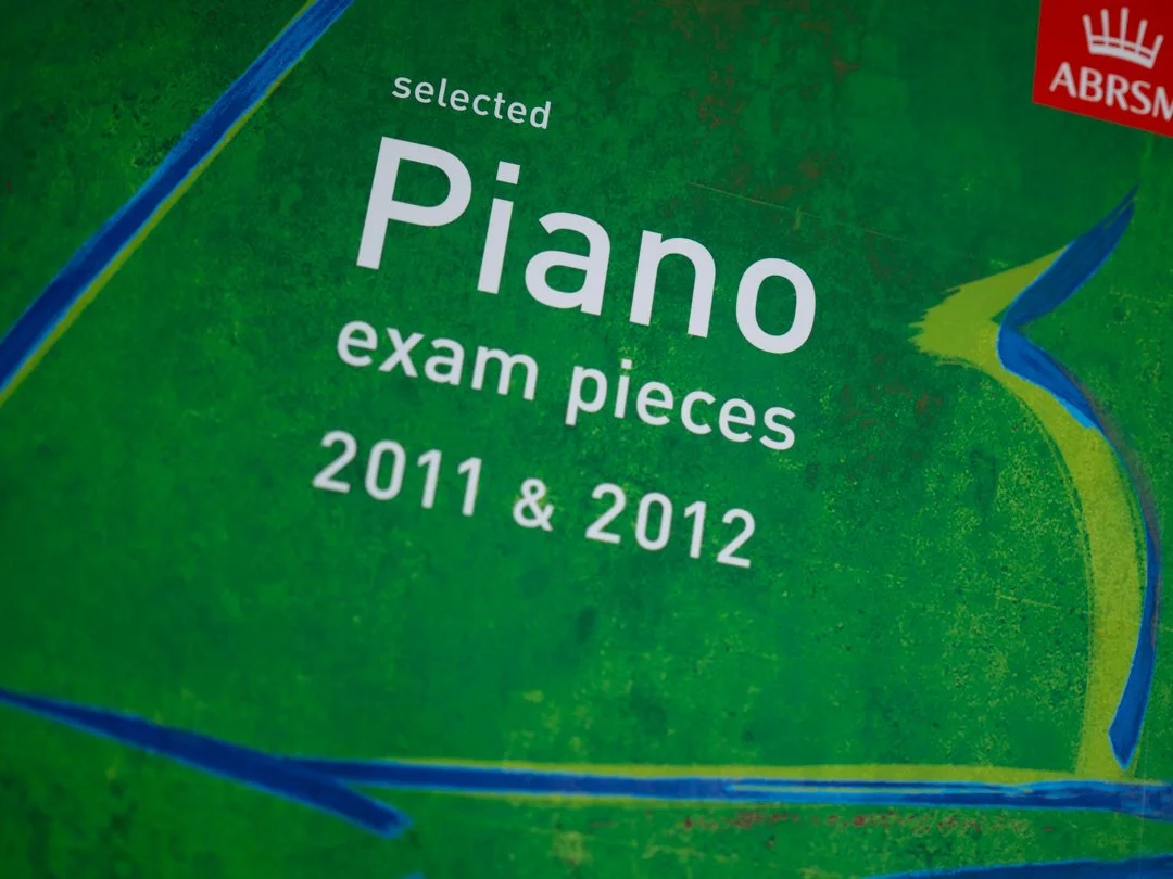 ABRSM Selected Piano Exam Pieces 2011–2012 book cover featuring repertoire from the piano exam syllabus