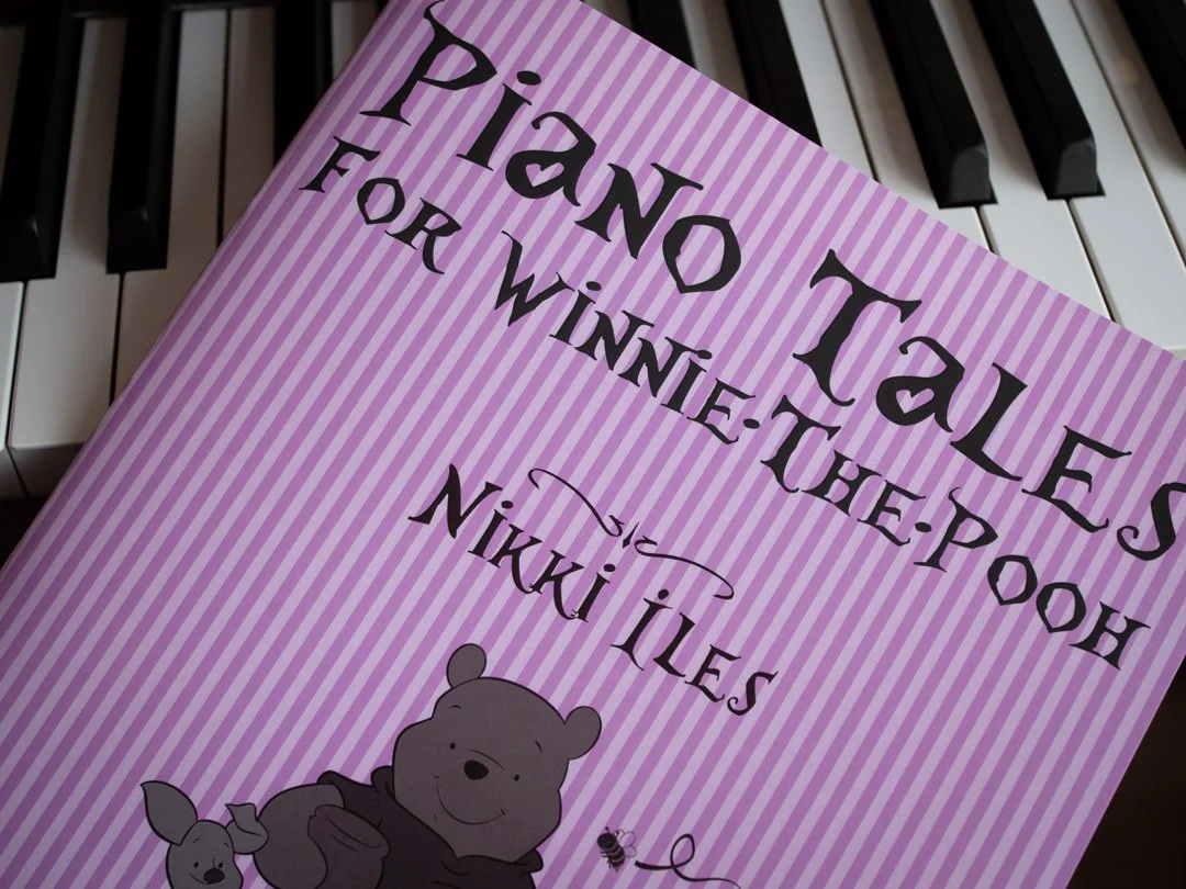 Front cover of Piano Tales for Winnie-the-Pooh by Nikki Iles piano sheet music book