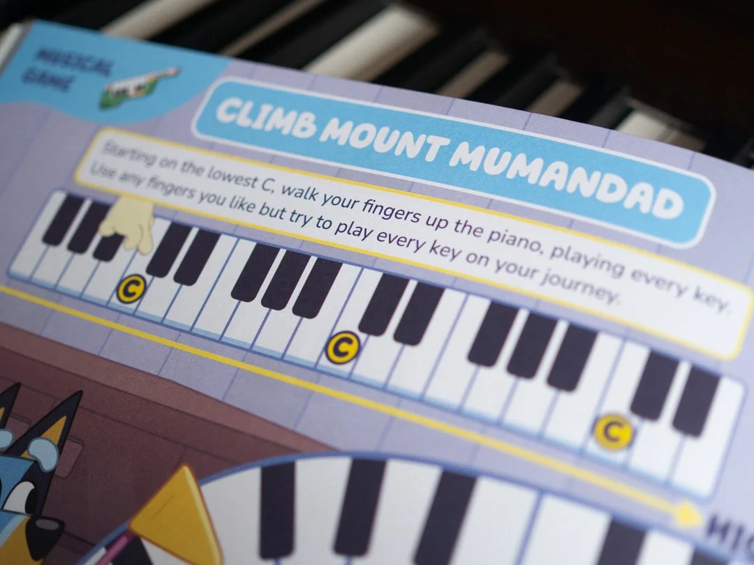 Find Middle C piano game from Bluey First Ever Piano Book for children