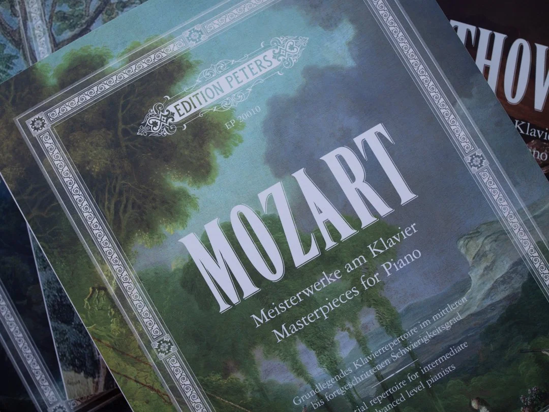 Mozart volume from the Edition Peters Masterpieces for Piano series on a piano