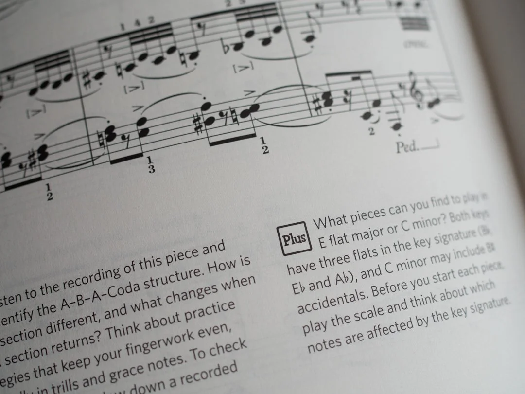 Footnote in ABRSM Encore Plus linking piano repertoire to practical musicianship activities and theoretical skills.