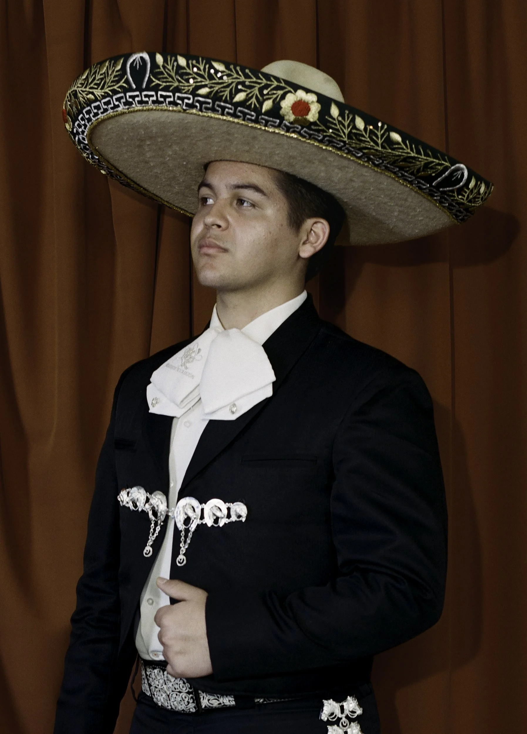 Erick Rodriguez, 2026
 
27½ x 19¾ inches 
 
 
4th-generation mariachi musician. Member of Mariachi Revolución. 
 
 
“Mariachi music isn't just the music I play; it's the legacy I carry, the voice of where I come from, and the path to where I'm going.
