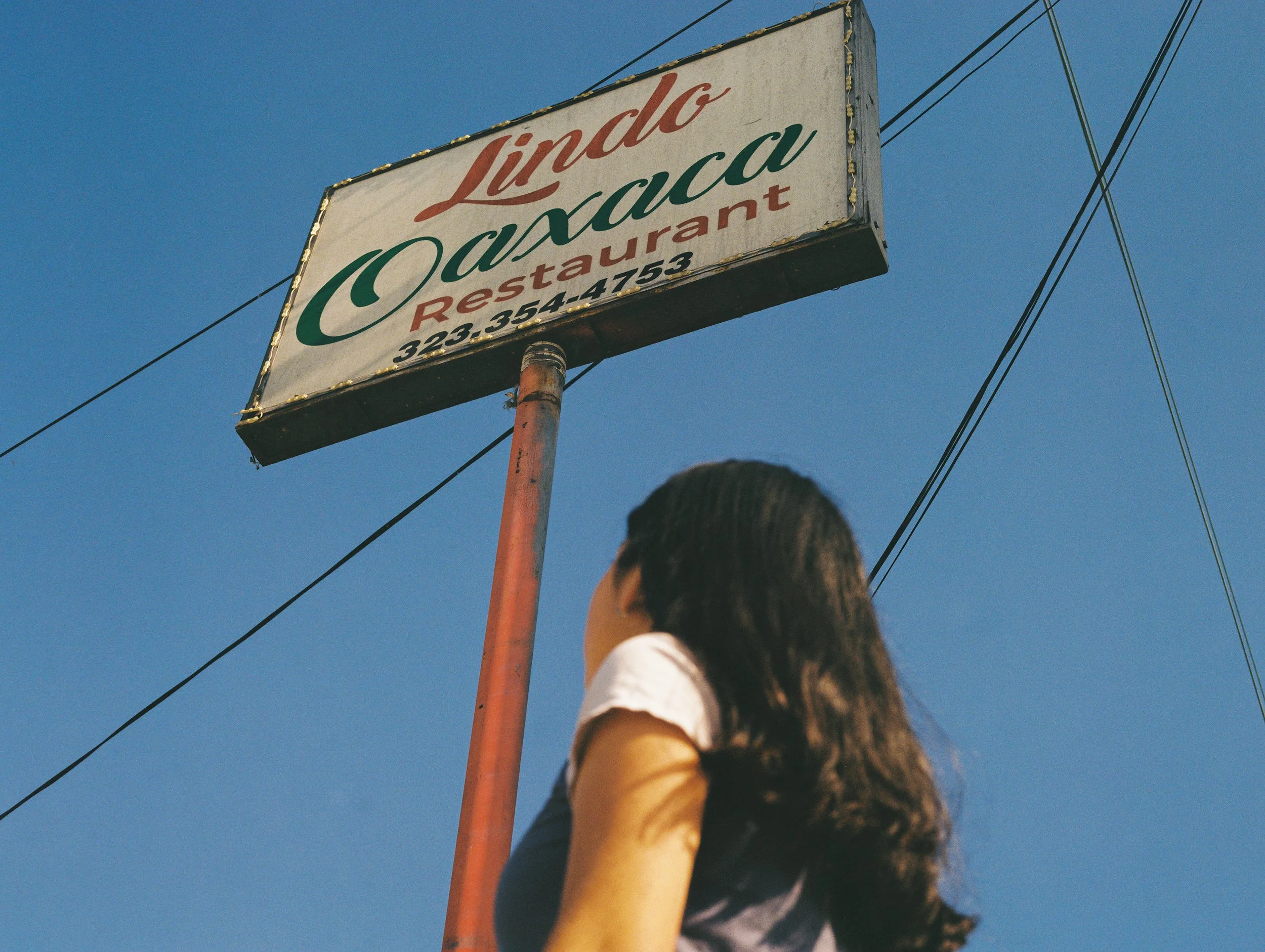  Lindo Oaxaca Restaurant , 2026, Medium format film, 16x20 inches
 
 
Lindo Oaxaca Restaurant has hosted and served the community of Los Angeles for years. After their recent move from Historic South Central to Boyle Heights, Lindo Oaxaca builds new 