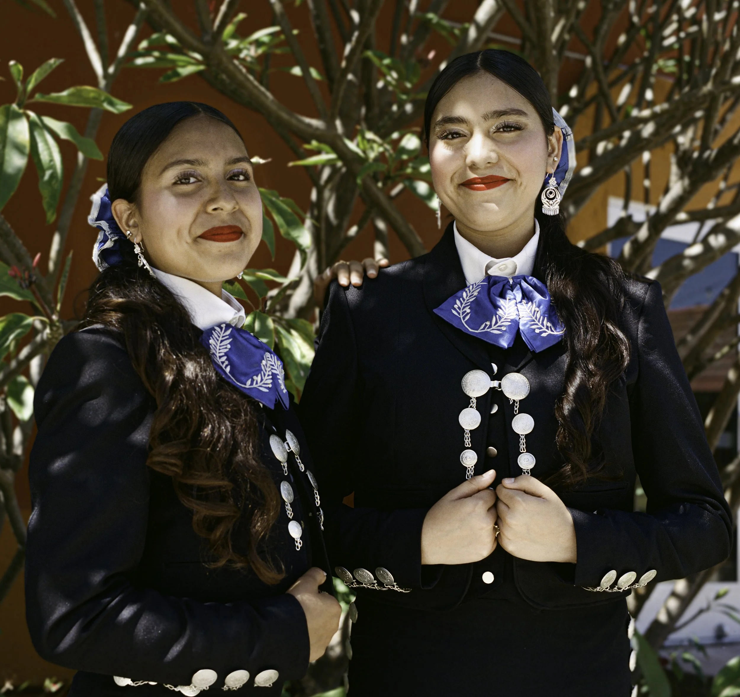 Araceli and Daisy Tamayo, 2026
 
16 x 16 inches
 
 
First-generation mariachi musicians. Members of Mariachi Plaza De la Raza.