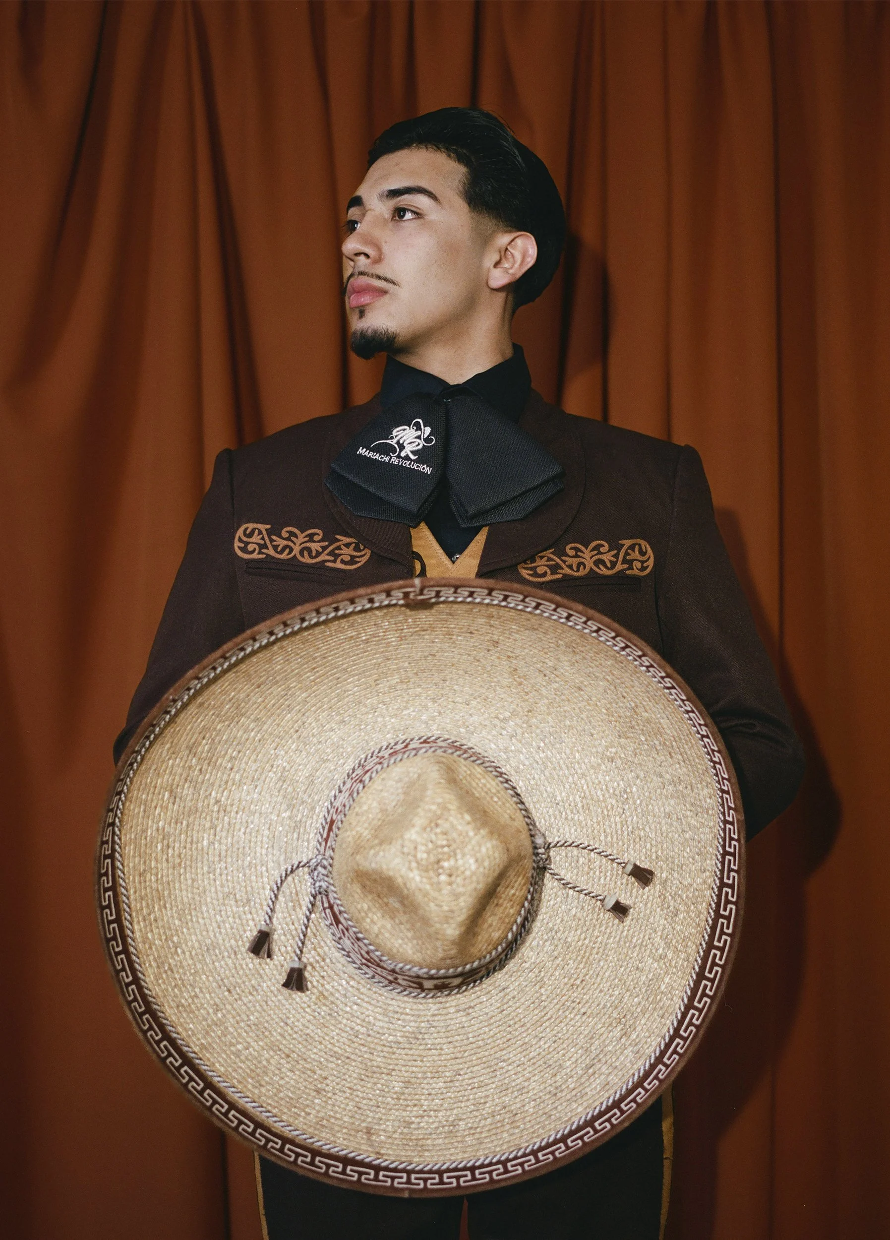 Leonel Lopez, 2026
 
27½ x 19¾ inches 
 
 
First-generation Folklórico dancer. Member of Folklórico Revolución. 
 
 
“Folklorico means honoring my culture, sharing its traditions, and expressing who I am through dance. Every performance reminds me wh