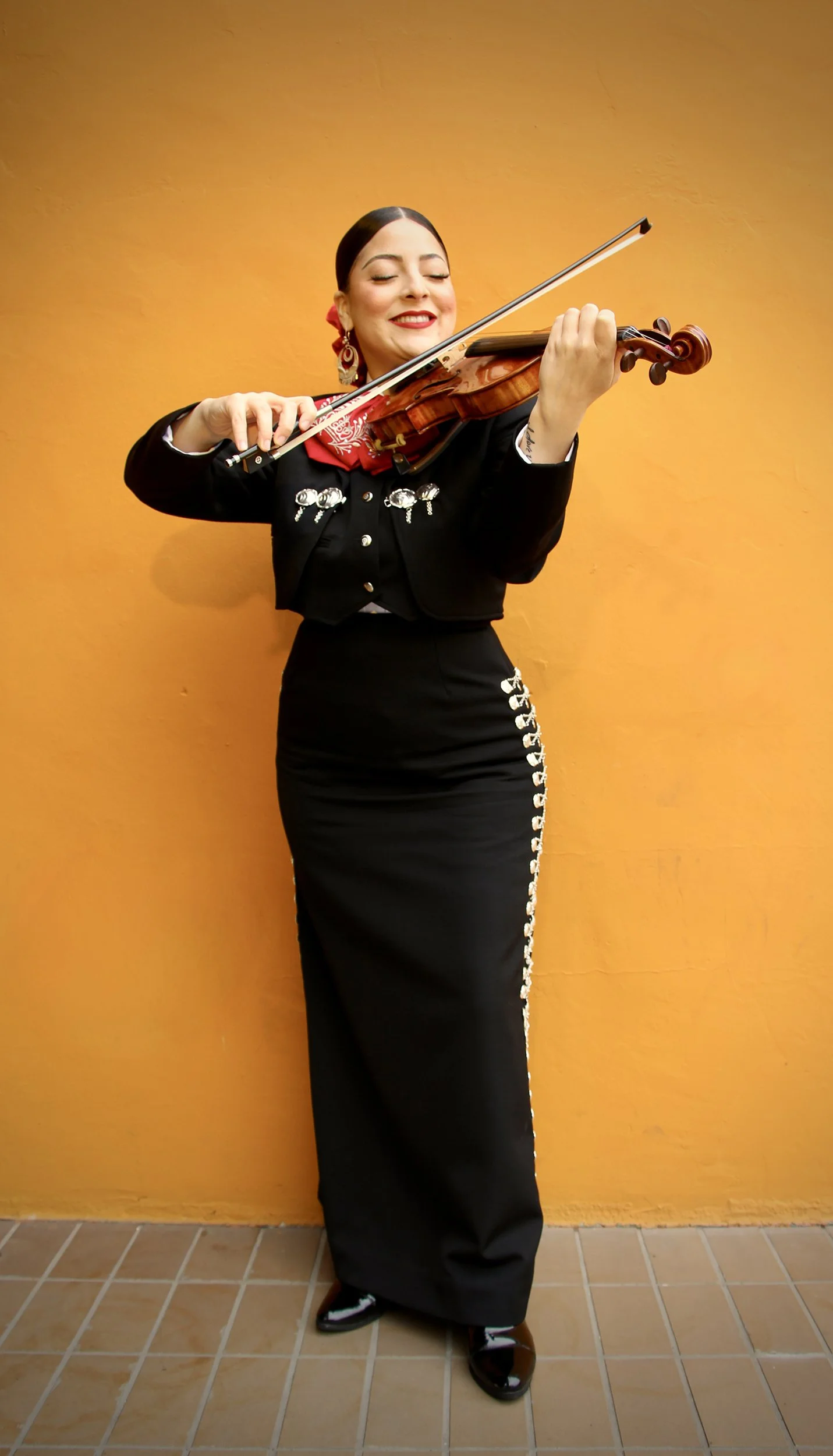 Monica Salinas, 2025
 
20 x 16 inches
 
 
First-generation mariachi musician. Member of Mariachi Reyna de Los Angeles.