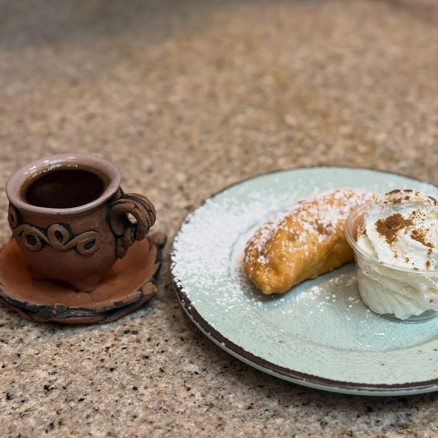 Rainy vibes ☔ + hot espresso ☕ = the perfect cozy ritual. Paired with a fresh Nutella banana- stuffed empanada 🥪🍌 &ndash; warm, gooey heaven that chases away the drizzle. What&rsquo;s your go-to rainy day indulgence? #RainyDayEats #nutella