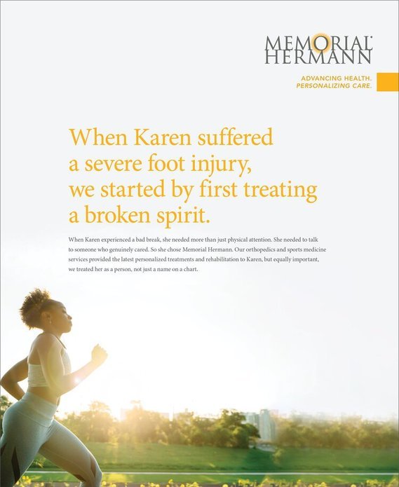 A young woman jogging outdoors at sunrise or sunset, with a park or open field in the background, promoting Memorial Hermann healthcare services.