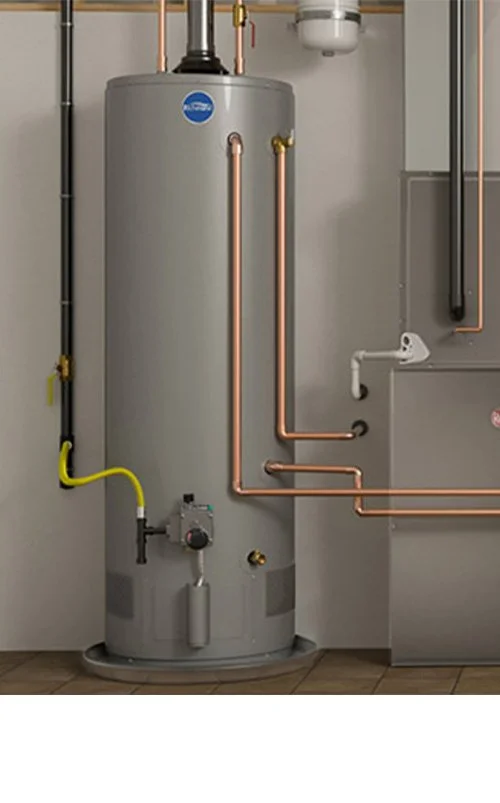 A water heater with copper pipes and various connected plumbing components in a utility room.
