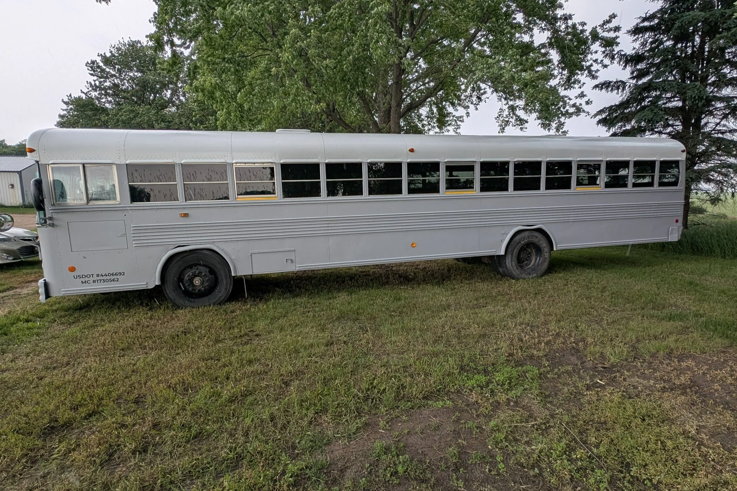 exterior of grey party bus
