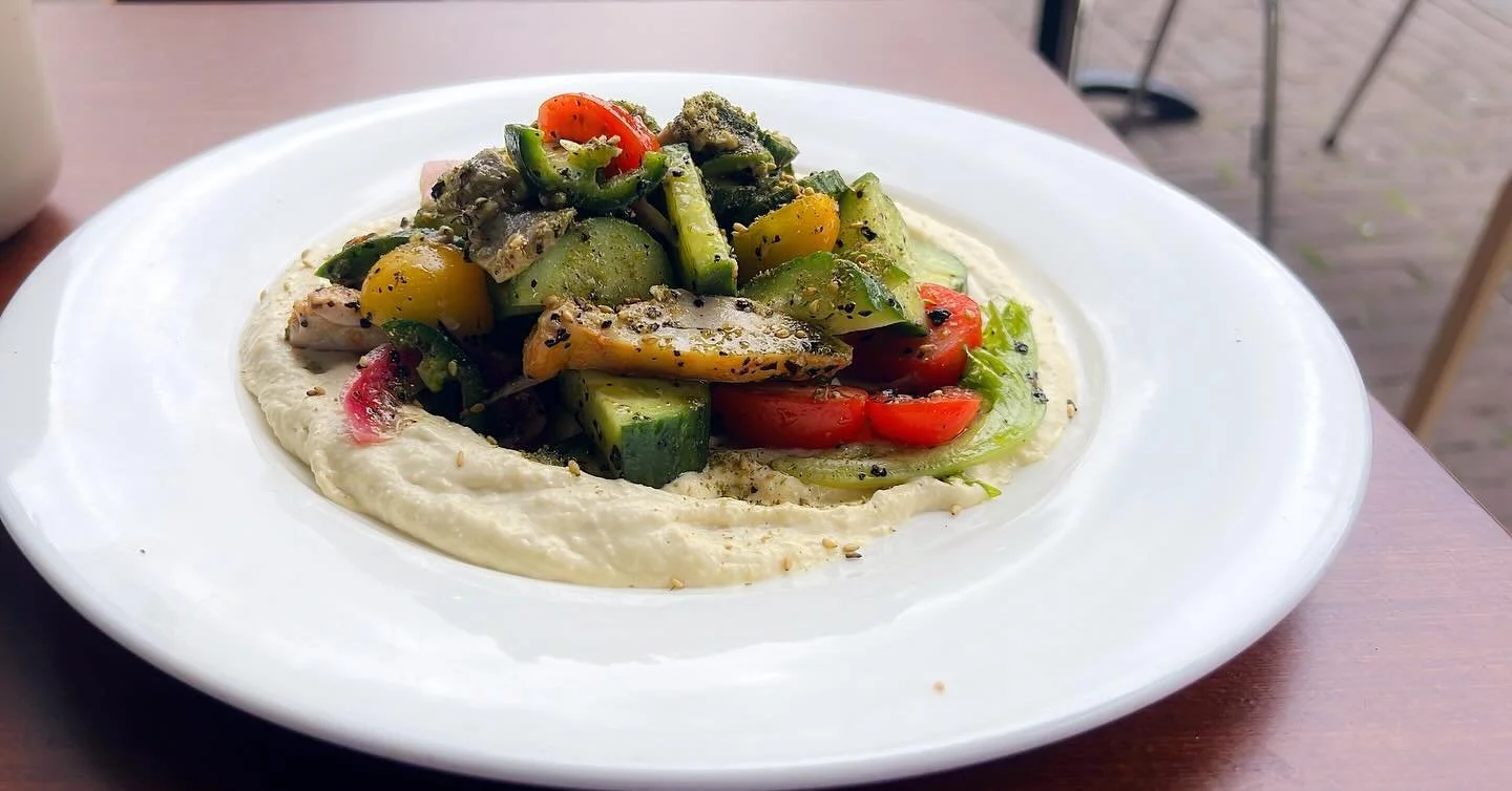 Launching next week 🌟
Our brand new Hummus Chicken Bowl &mdash; creamy hummus topped with roasted chicken, crisp cucumber, pickled onion, cherry tomatoes, pomegranate, and a zesty lemon-olive oil dressing.
Fresh, bold, and full of flavour. Don&rsquo