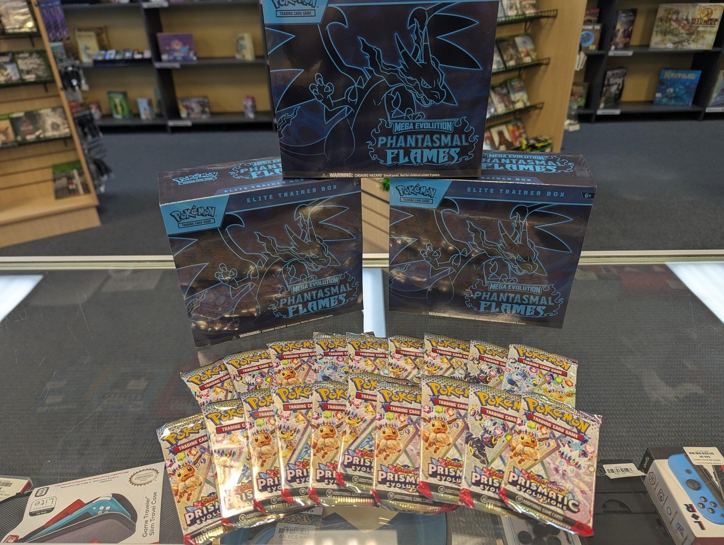 Now BACK IN STOCK! We have ETB Boxes for the new Mega Evolution Phantasmal Flames Pok&eacute;mon cards and Booster Packs for Prismatic Evolutions. 

Grab yours while you can! These are guaranteed to go fast 💨

#Pokemon #EliteTrainerBox #PhantasmalFl
