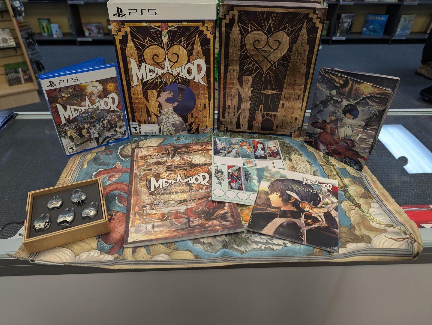 Amazing find for a Metaphor ReFantazio fan!

Bundle set complete with the game, pins, art book, soundtrack, optional steel book, stickers (though a few are missing) and a fabric art print! 

#Metapor #ReFantazio #Playstation5  #