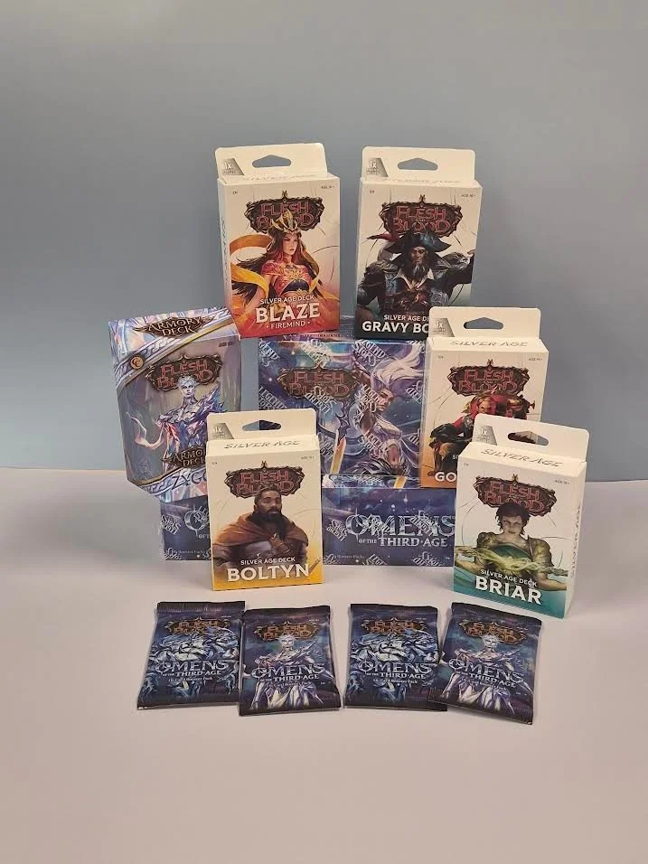 Looking for a new TCG to get into? Or maybe you already are a fan of the Flesh and Blood collection?

Well - Gamescape now has Chapter 3 AND Omens now in stock! We even have a Pre-Constructed Deck with Zyggy available.

Stop by today and check them o