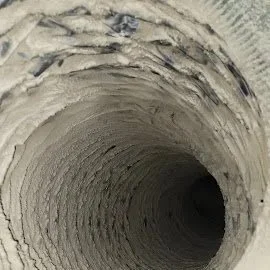 Dust Accumulated in a dryer vent ready to be cleaned