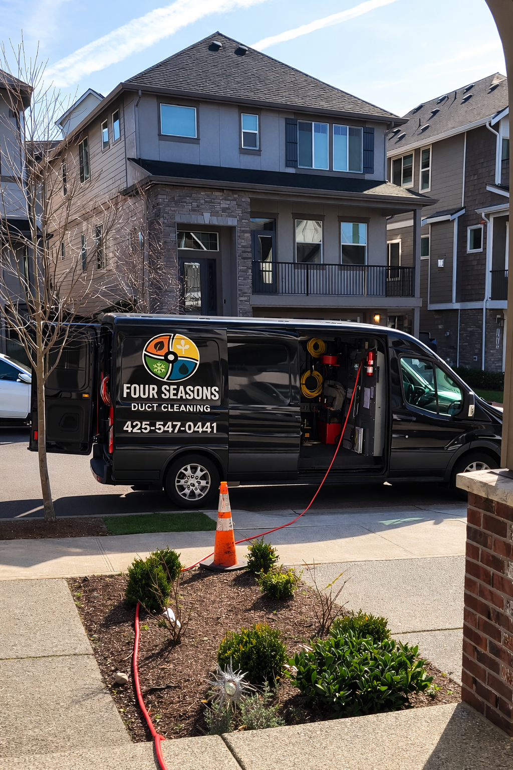 Four Seasons Duct Cleaning Van Staged at a residential duct cleaning job