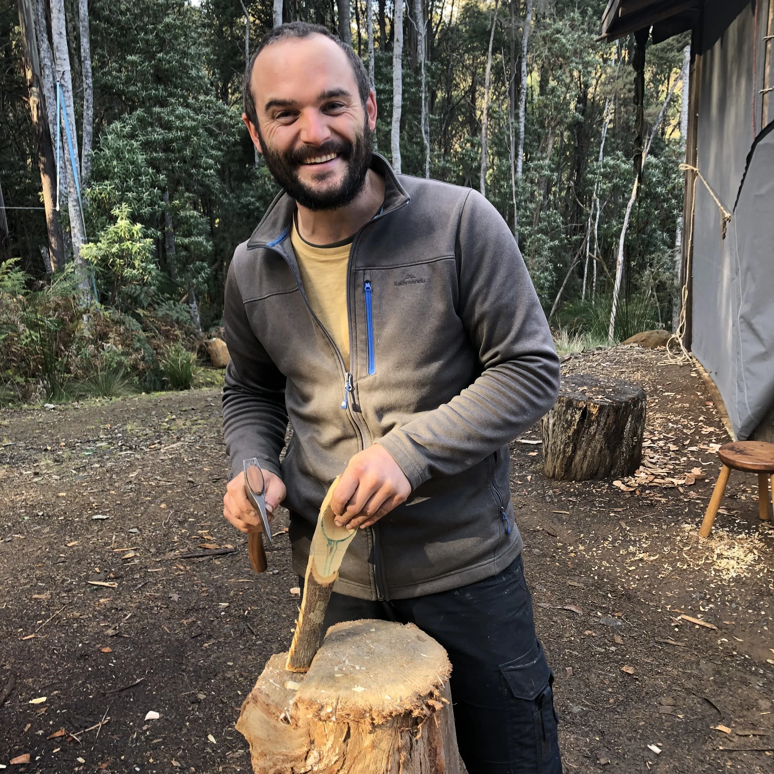 Workshop participant enjoying the Full-day spoon carving workshop, Wisdom Through Wood.