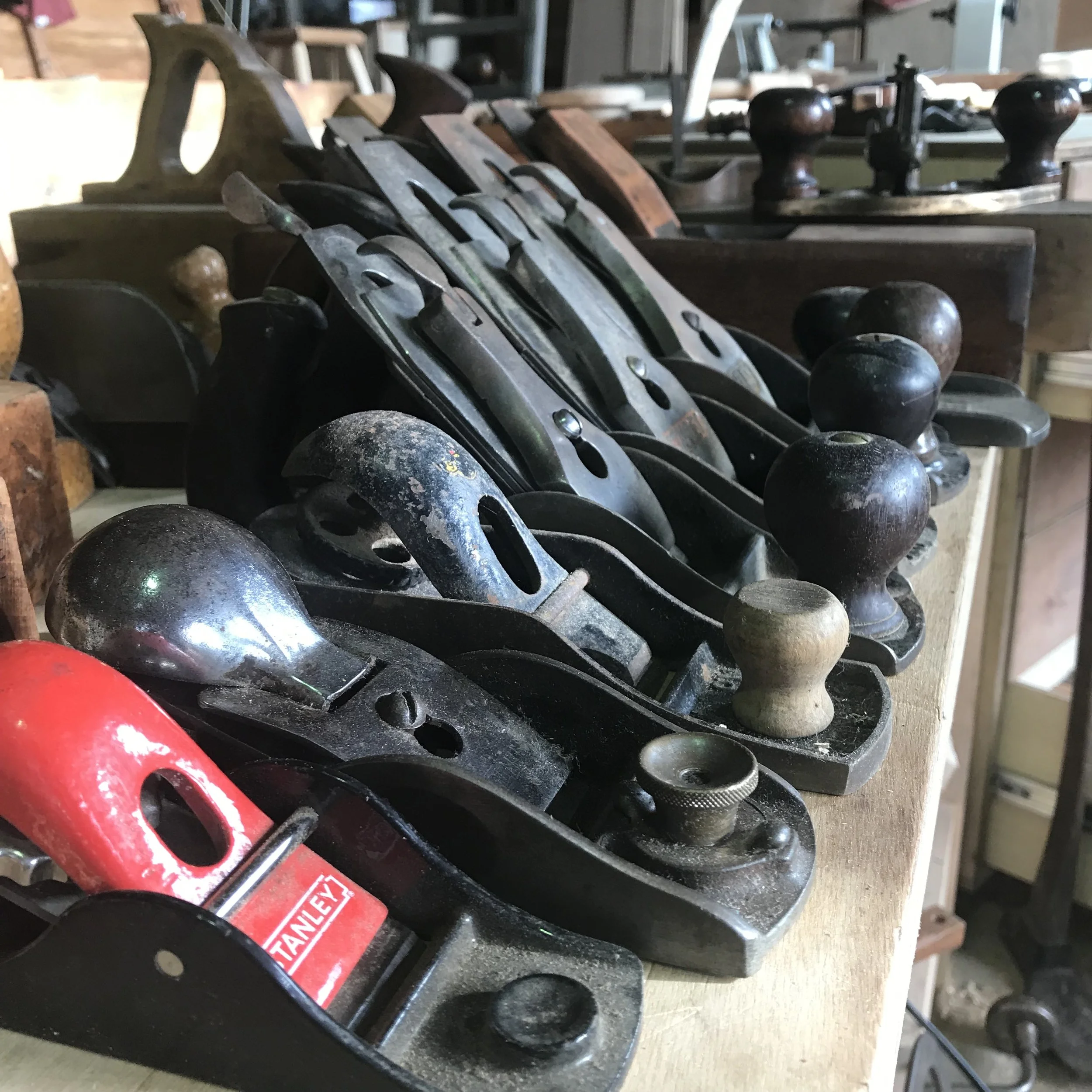 Various tools in the Wisdom Through Wood workshop.