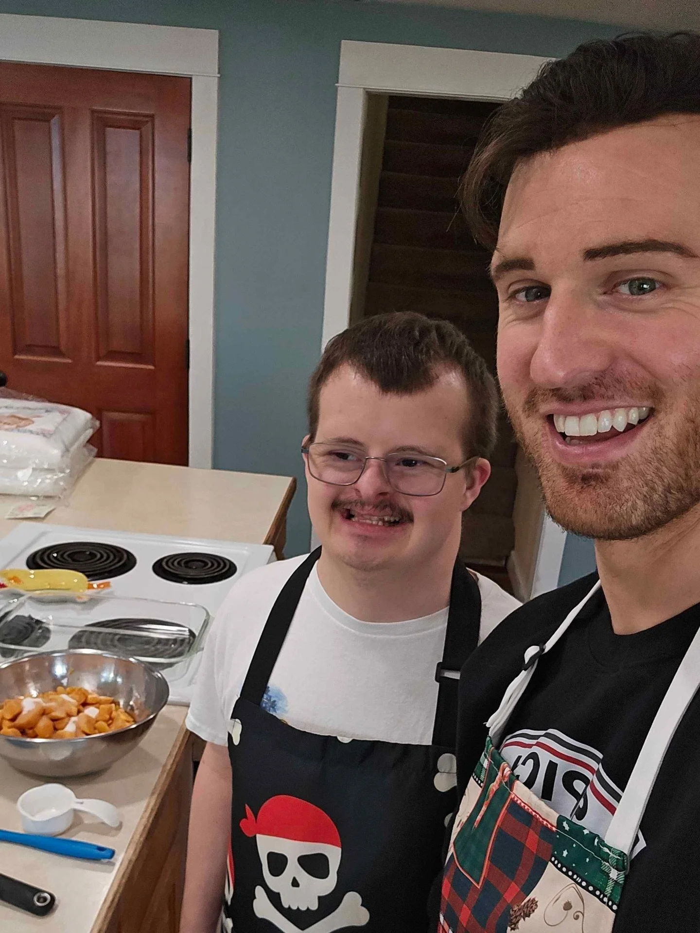 In the kitchen whipping up a gluten-free sweet potato casserole for our NWFI Friendsgiving! 🍠✨