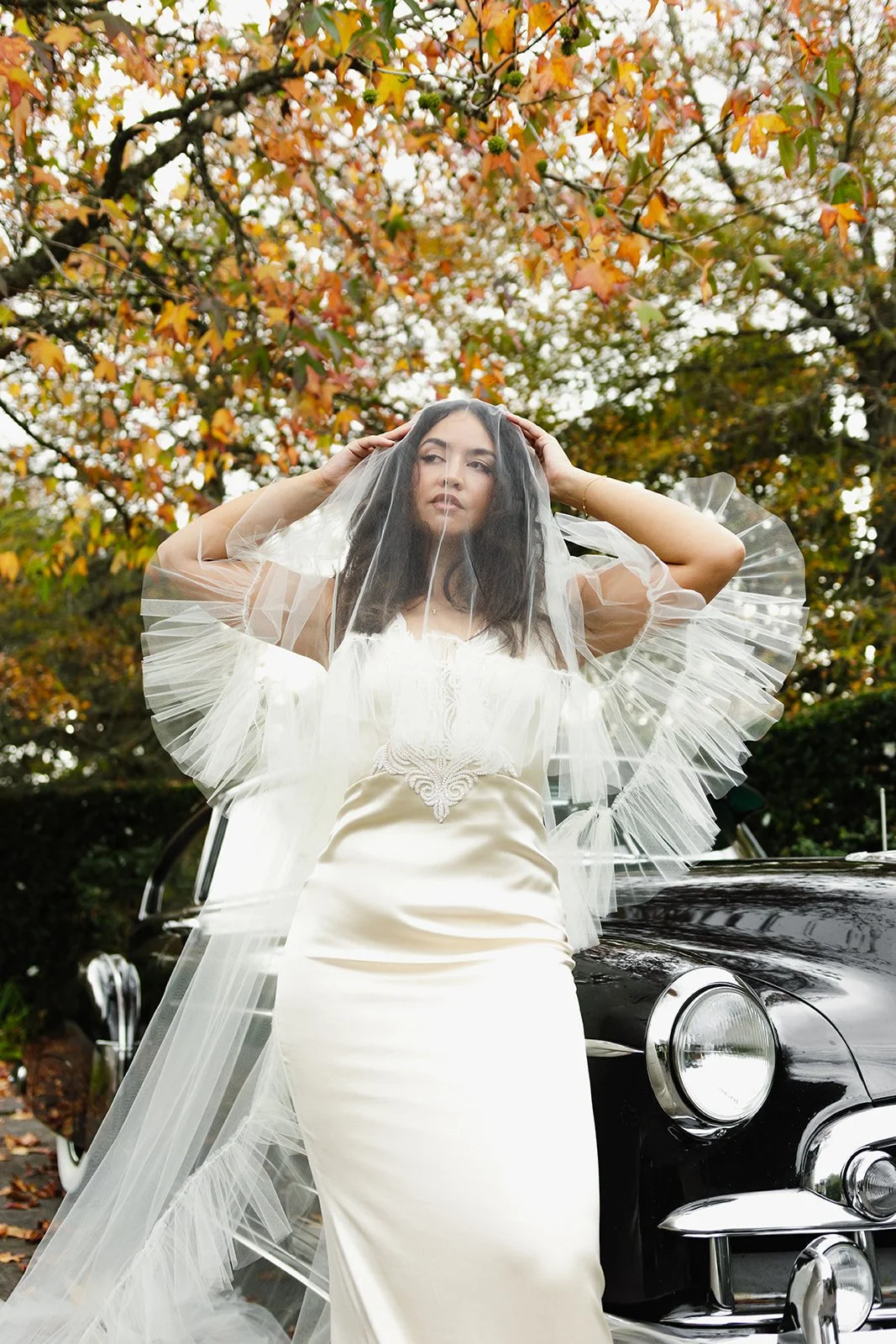 Tan woman, bride, wedding, bridal makeup, bridal hair, curly bridal hair, soft glam makeup, veil, wedding dress, bridal dress