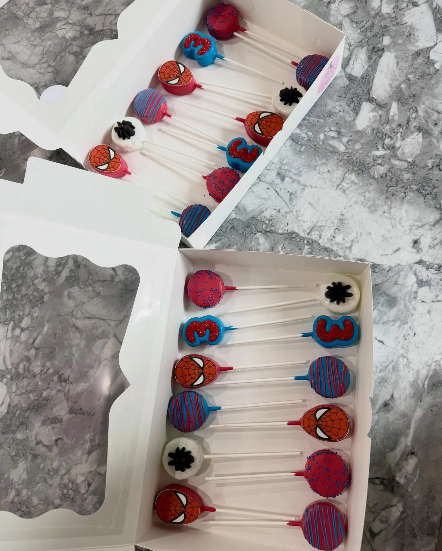 2 dozen Spidey pops! #cakepops #cakepopsofinstagram #cakepop #spidey #customtreats @daisymakes_innovations