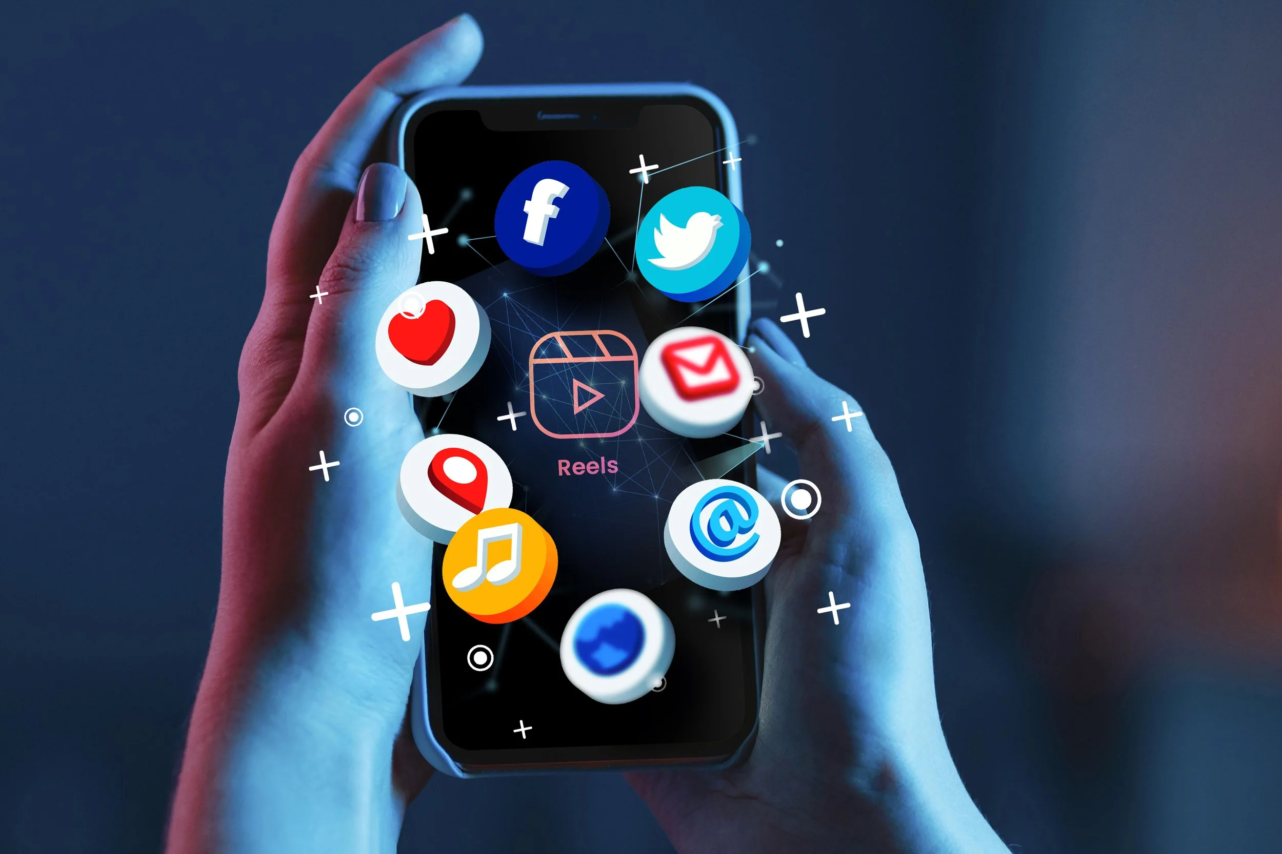 A person holding a smartphone with various social media app icons, including Facebook, Twitter, Instagram Reels, and email, floating around the screen.