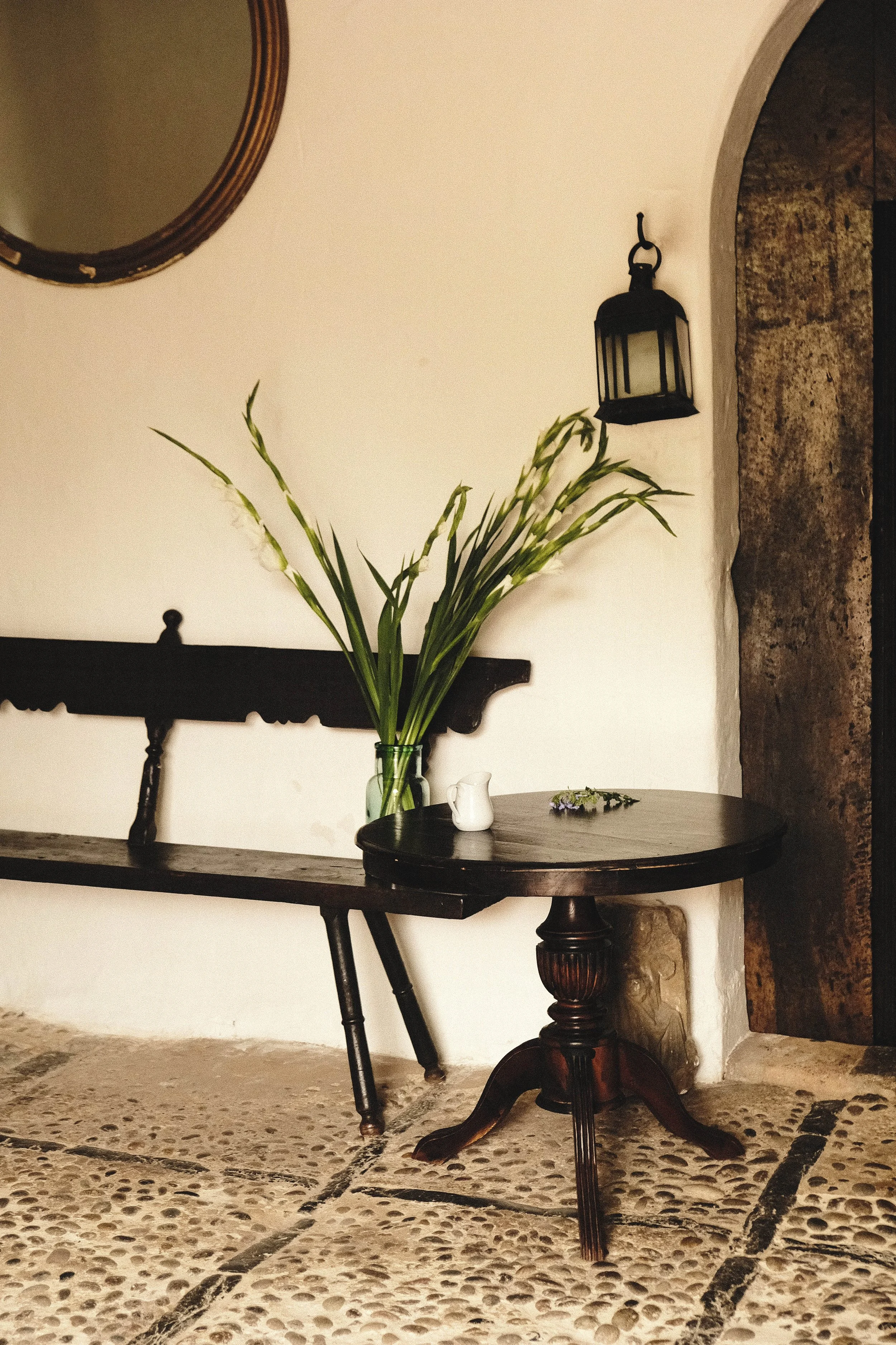 deia-monastery-interior-gladiolus-antique-table.jpg