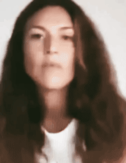 Woman with long hair preparing for an online sound practice
