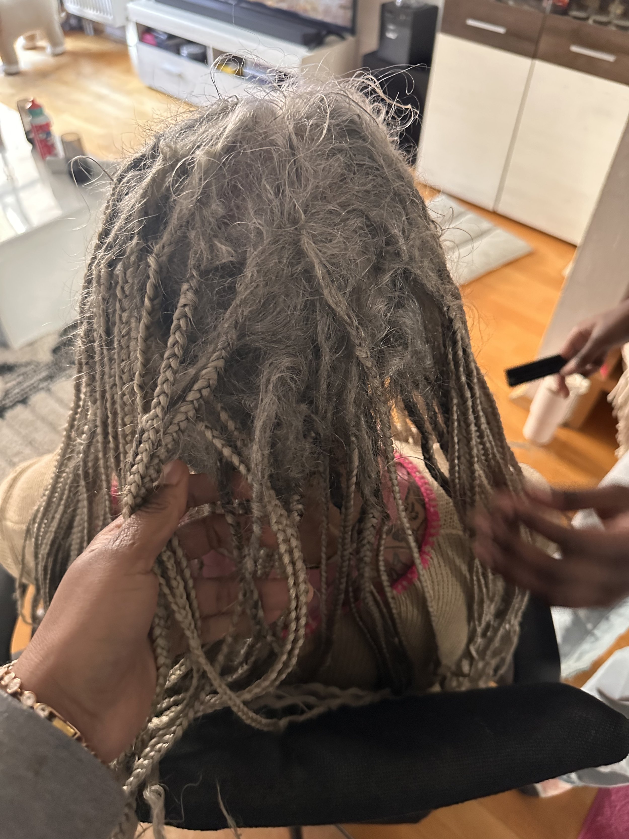 Time to Take Down Your Braids (And How to Do It Safely)