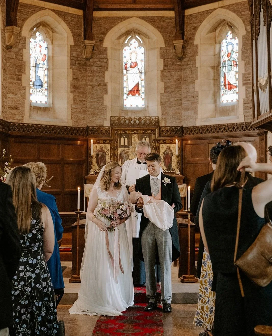 We were married in a beautiful countryside Church, surrounded by soft fields and the Welsh hills.⁠
⁠
Alice was also baptised. She was wearing my christening gown, which was made from my mothers wedding dress.⁠
⁠
Photography by @amylouiseweddings⁠
Dre