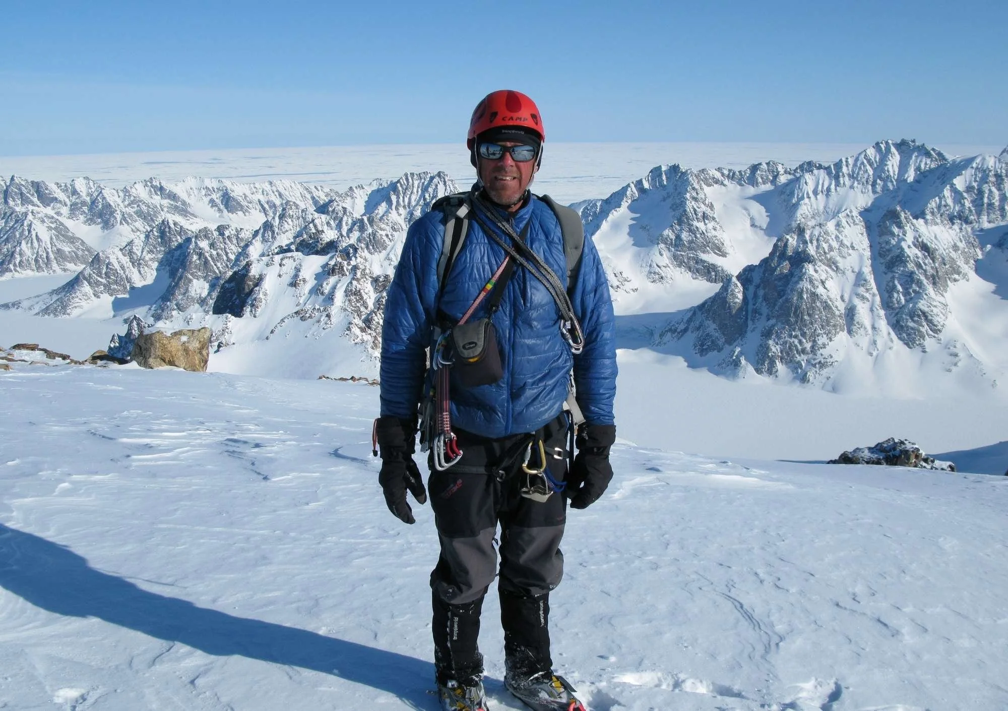 a man is on snowy mountains