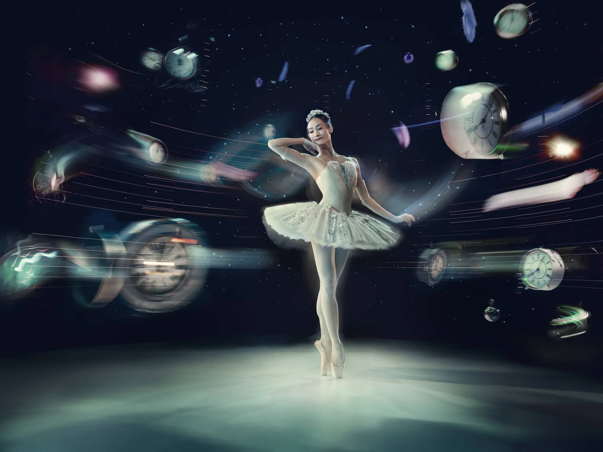 image shows ballerina with a backdrop of space