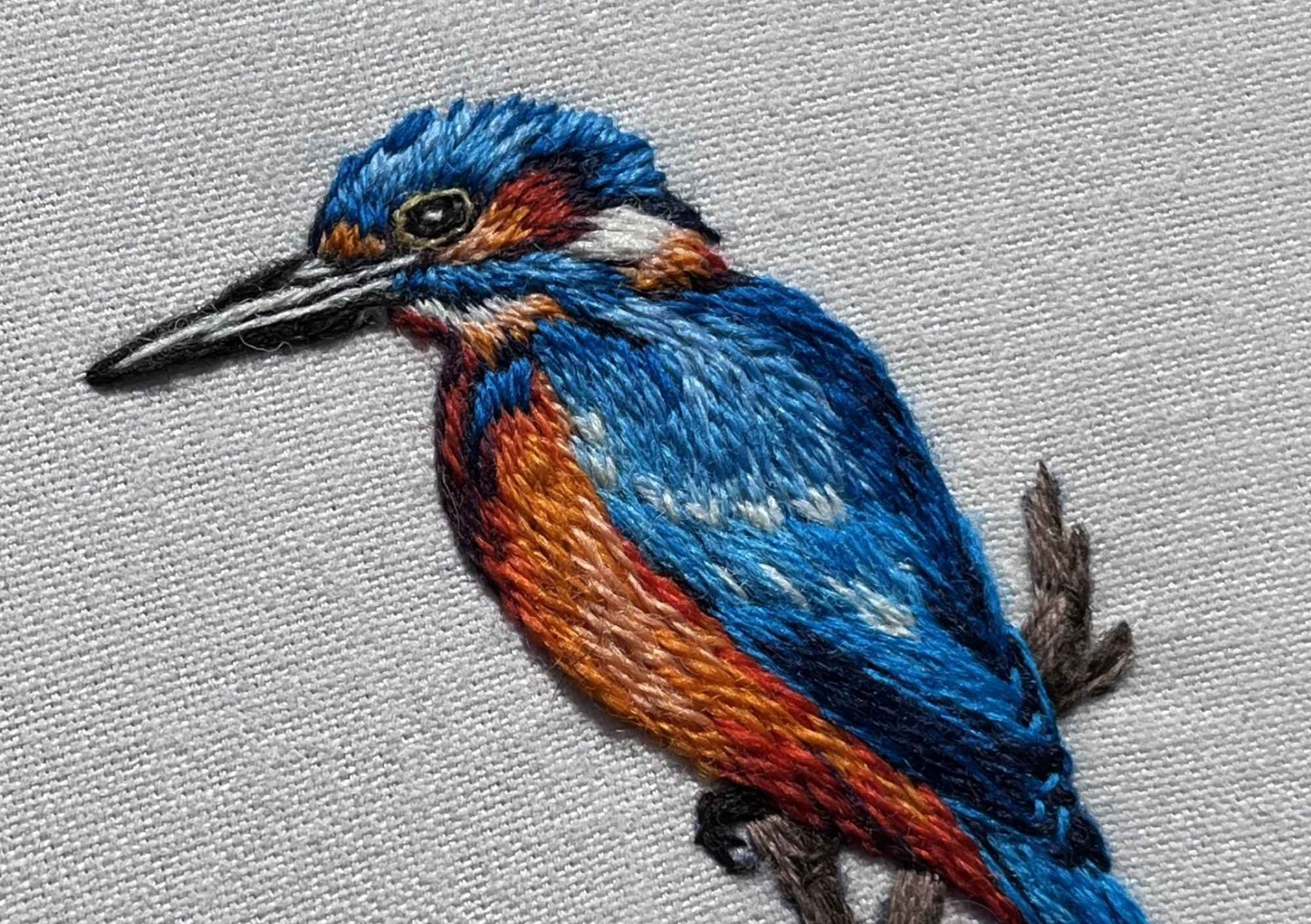 embroidered blue bird