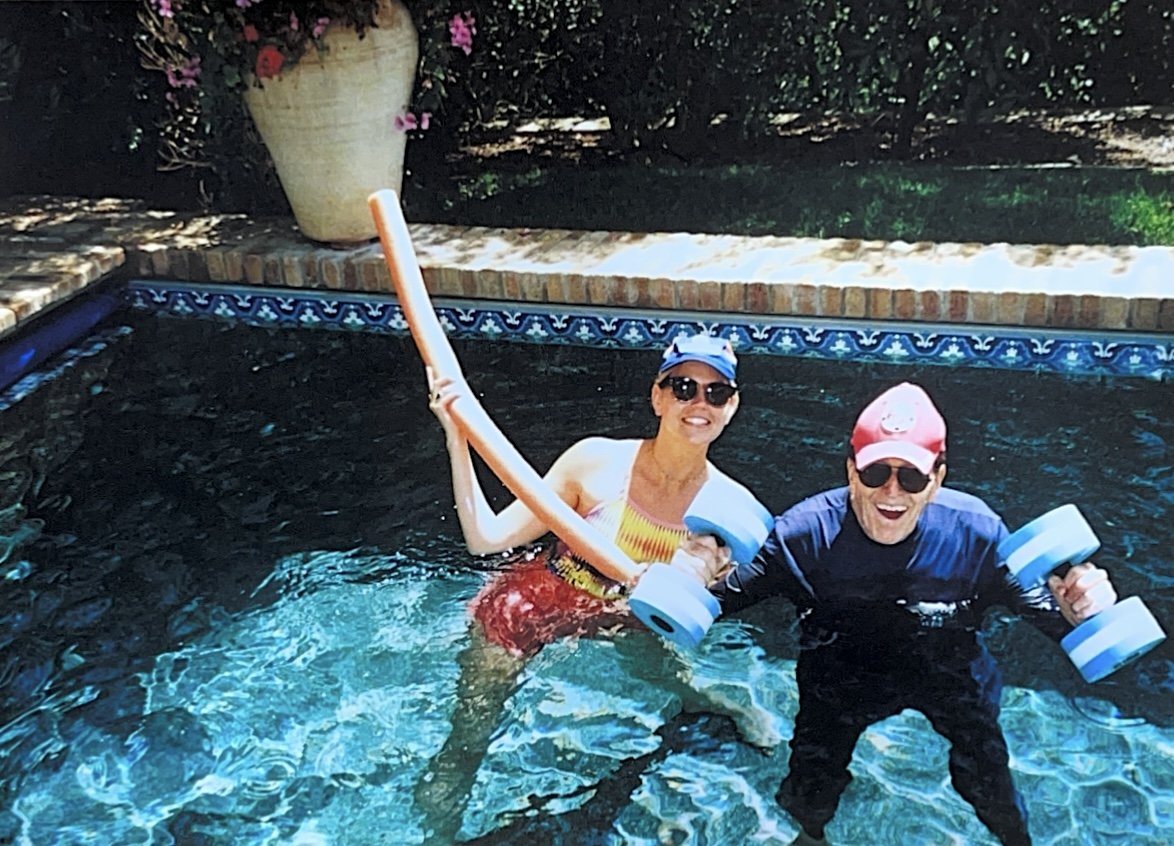 Shannon Barrett providing aquatic physical therapy to a patient in a pool