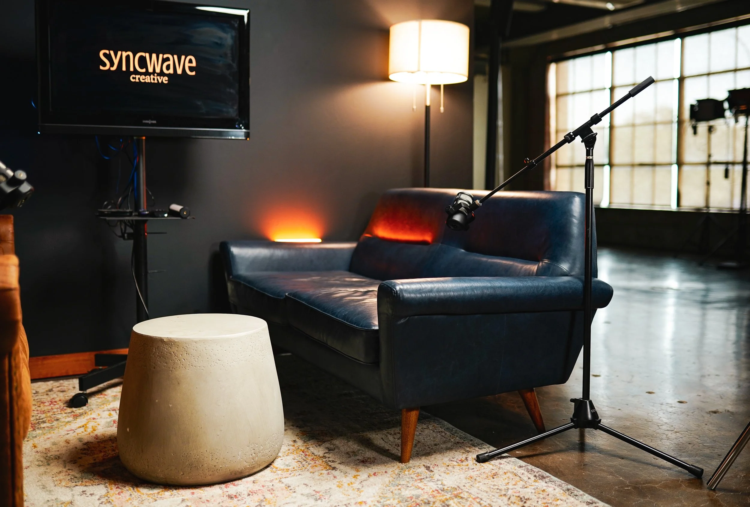 Syncwave Creative Fort Worth podcast studio, microphone and acoustic room”