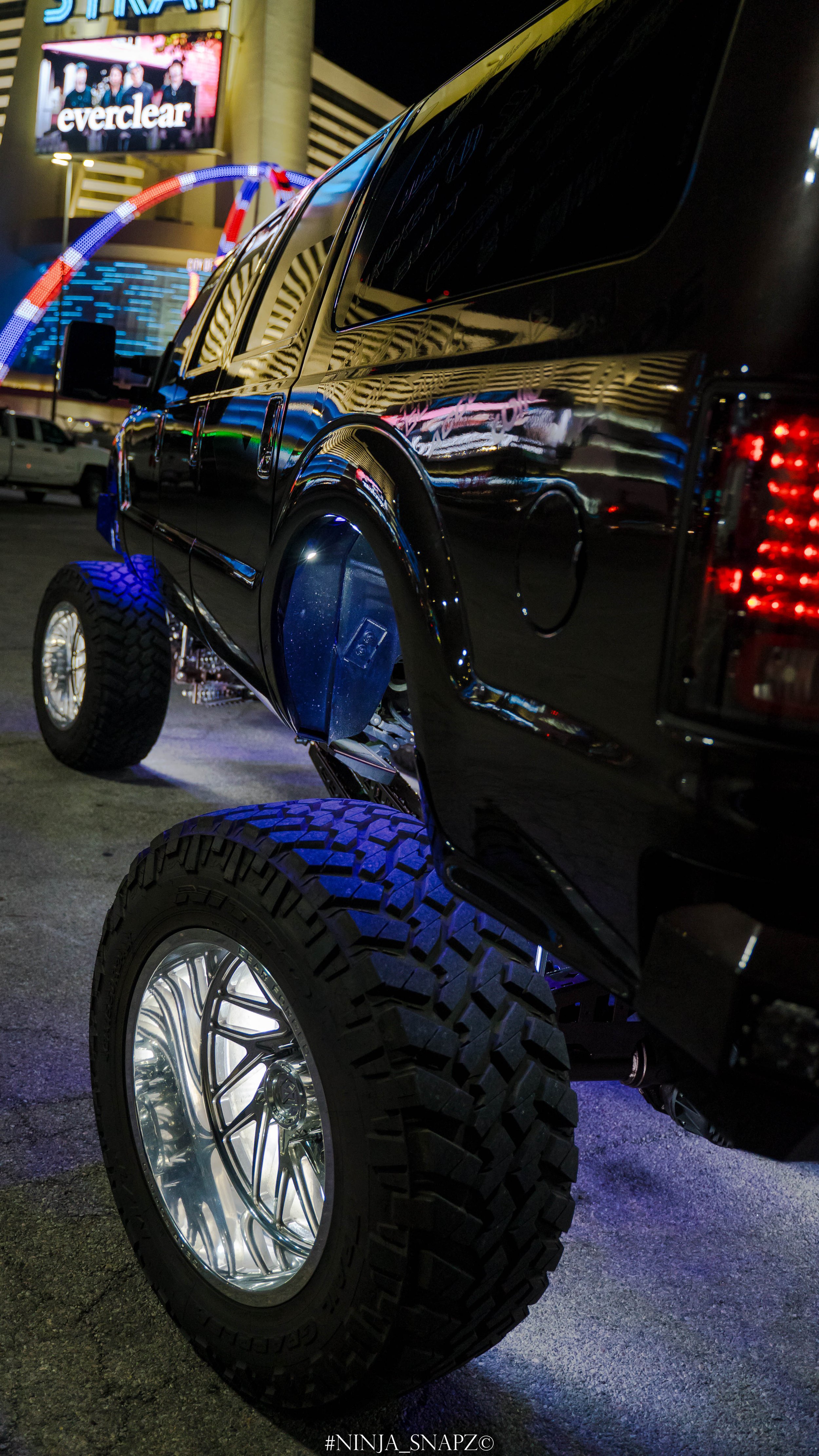 Close up photo of the Rear Steering on our Ford Excursion with blue Rock lights.