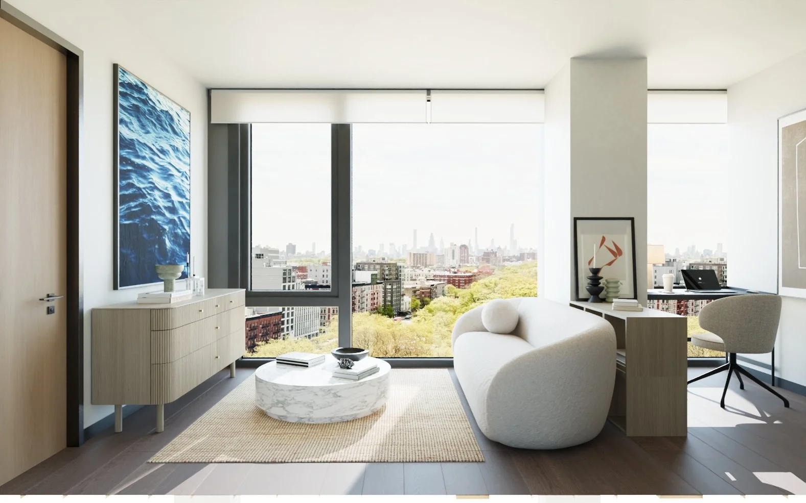 Spacious Harlem apartment living room at The Forten, featuring floor-to-ceiling windows with city and park views, modern furniture, and a dedicated study area near Columbia University.