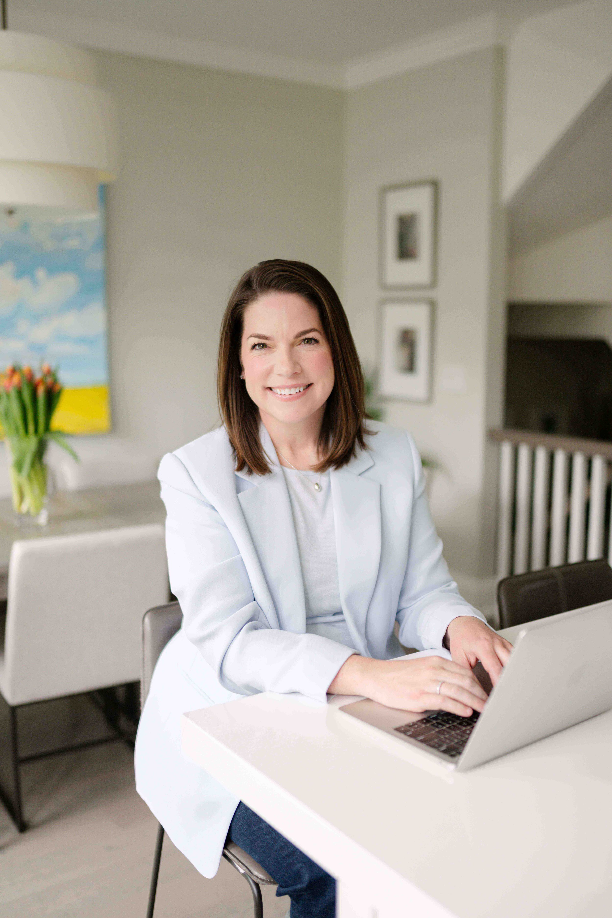 Courtney Edmundson sitting at desk